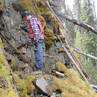 PEMC Geologist Mapping Outcrop
